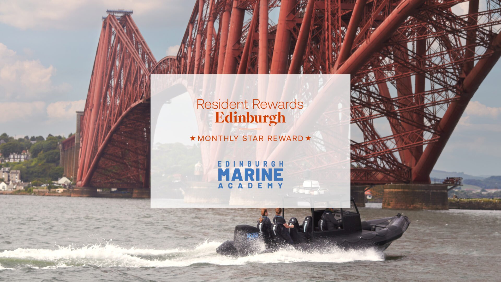 Speed boat going under the Forth Bridge.